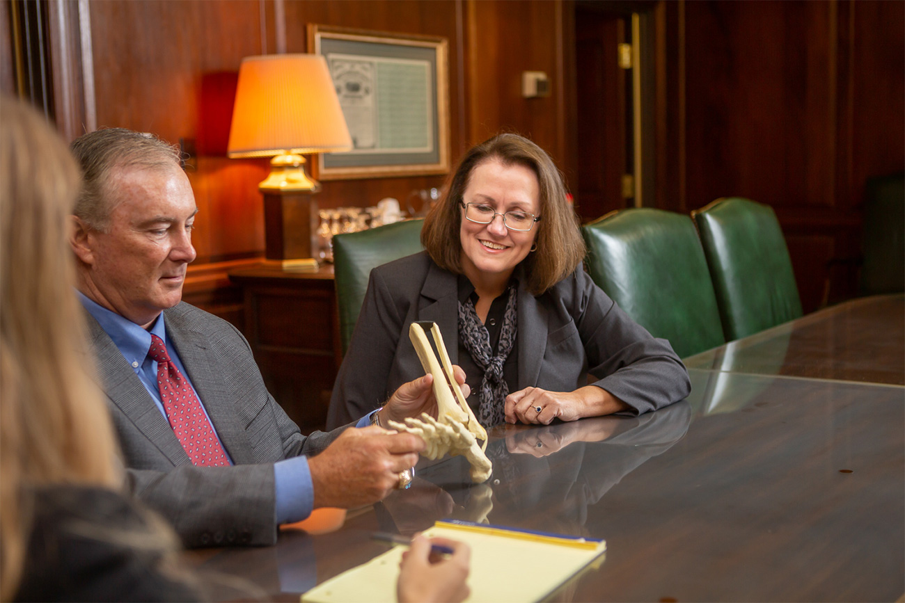 med mal attorneys meeting in conference room